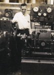 Roy Napps servicing large commercial equipment in mid 1950's